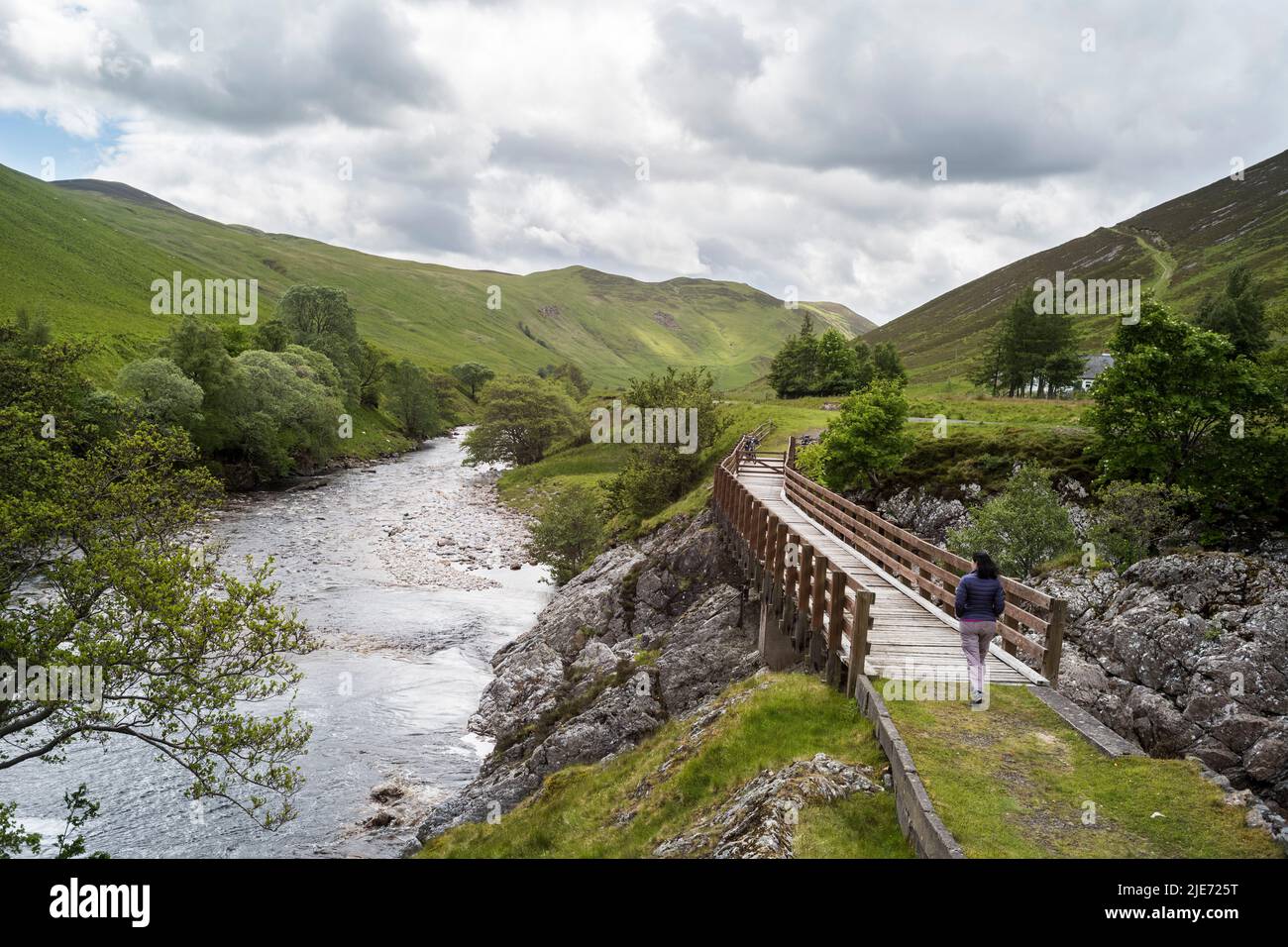 a footbridge in Glen Tilt, over the river tilt, near Blair Atholl,  Perthshire,  Scotland. Stock Photo