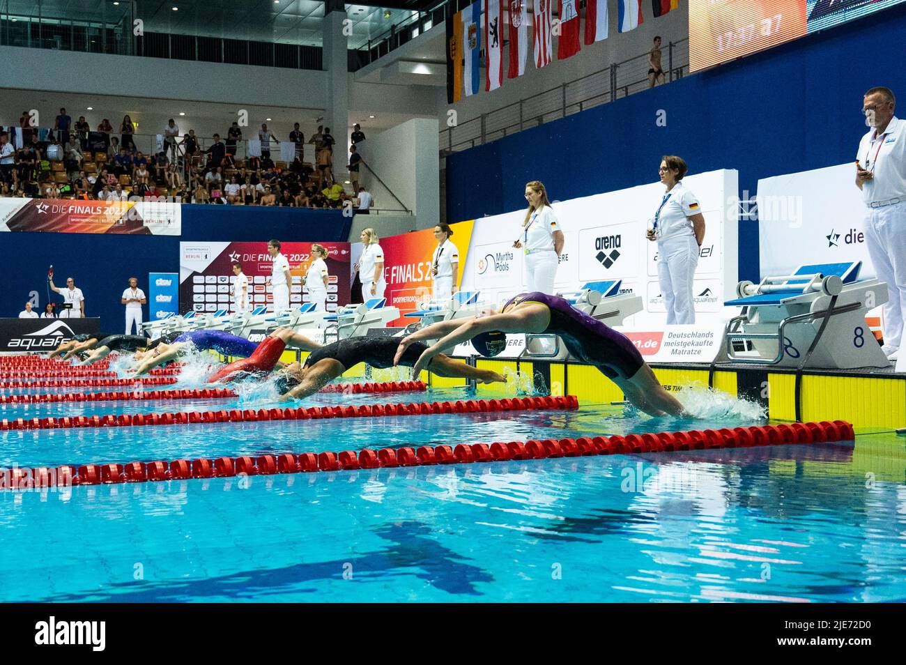 Berlin, Germany. 25th June, 2022. Swimming: German championship, decisions:  50 m breaststroke, women, award ceremony. Nele Schulze (M, 1st place),  Julia Titze (l, 2nd place) and Nicole Heidemann (3rd place) are on