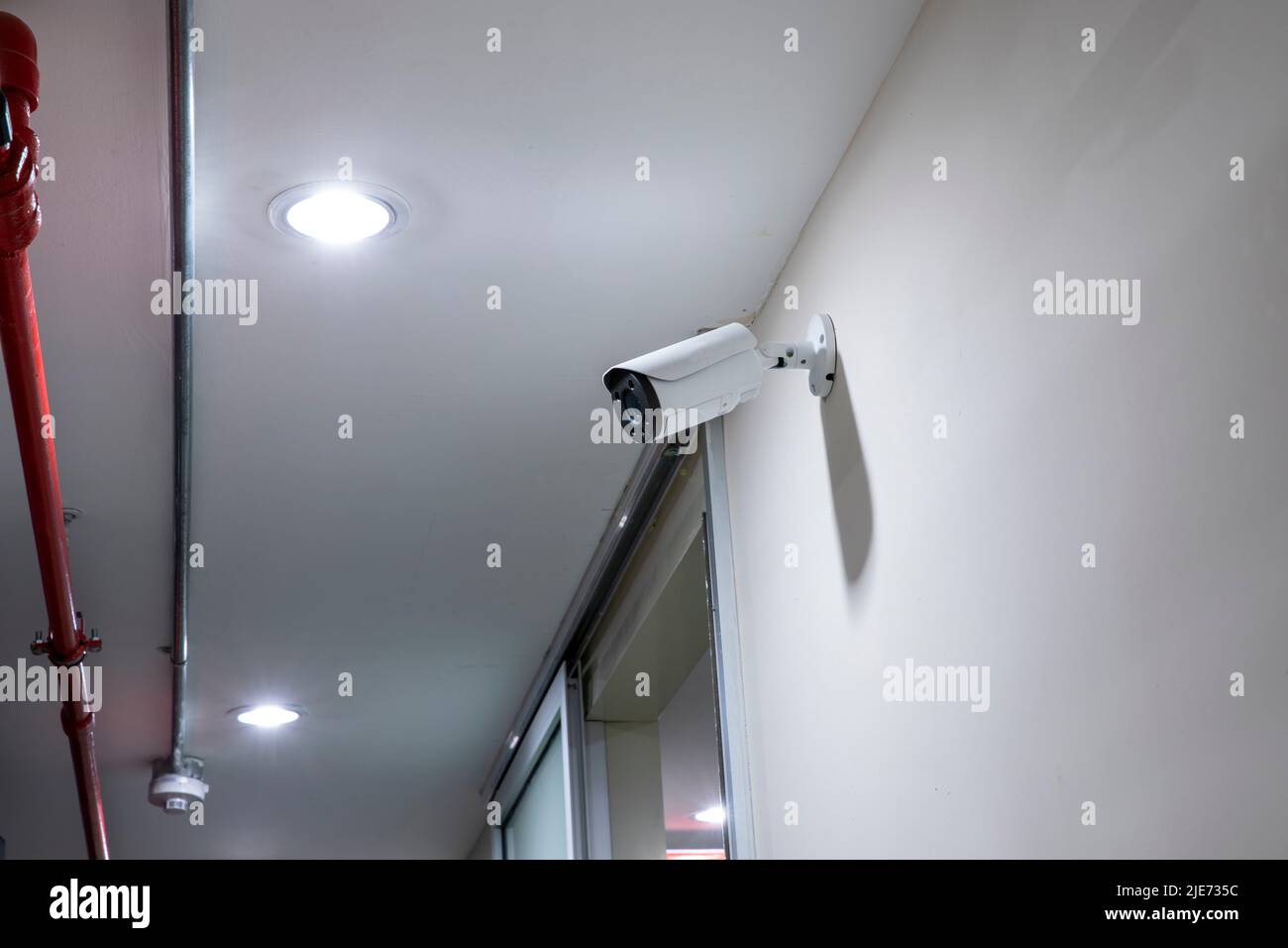 Modern CCTV camera on a wall Stock Photo