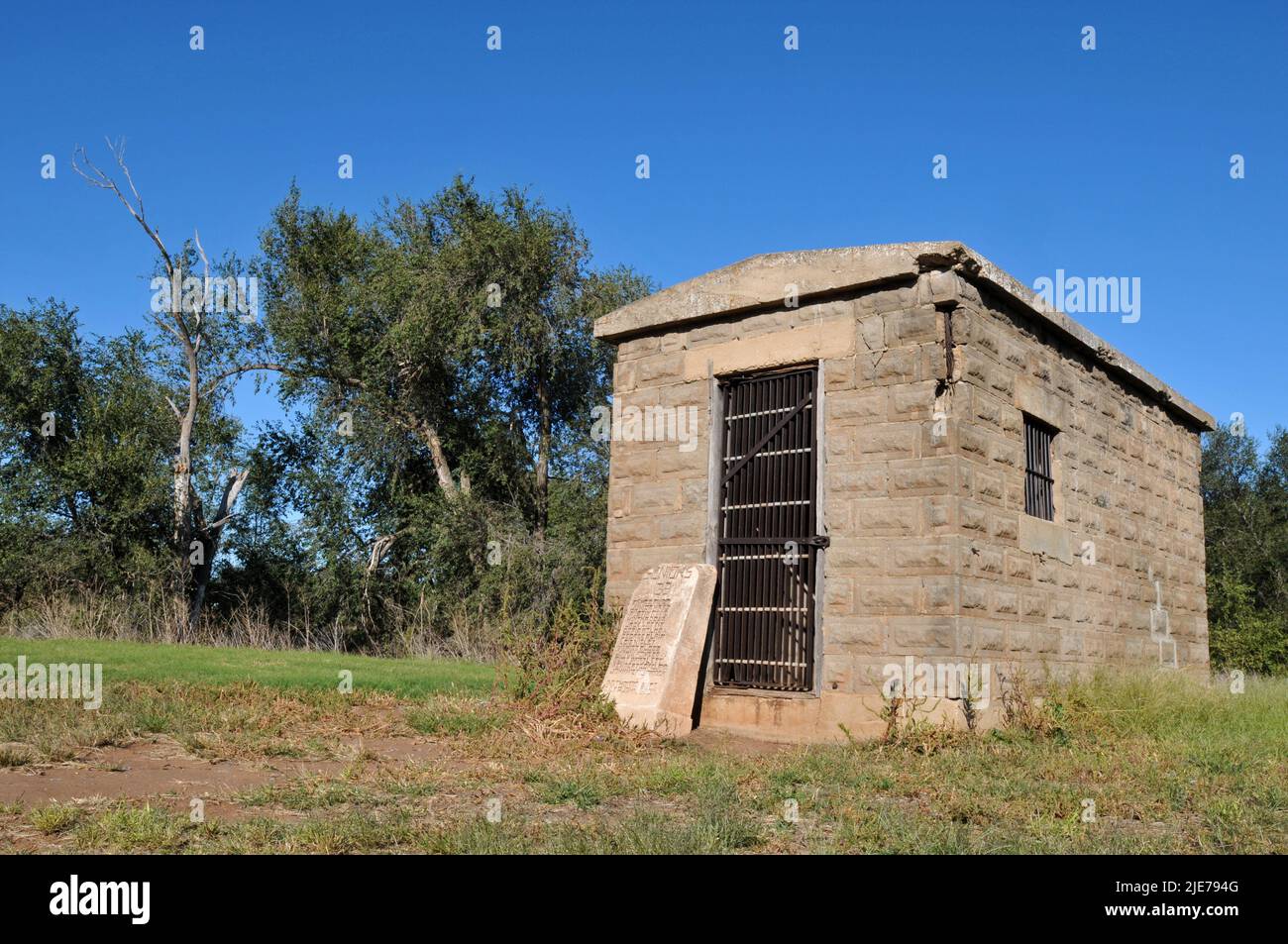 The historic one-room cinderblock jail stands in a field in the small Route 66 town of Texola, near the Texas state line. Stock Photo