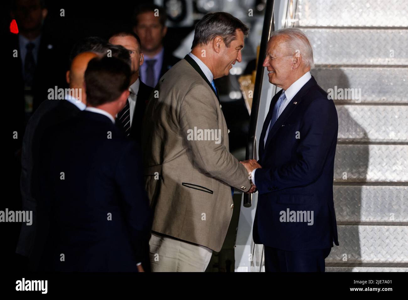 U.S. President Joe Biden is welcomed by Bavaria's State Premier Markus Soeder as he arrives for a G7 summit at Munich International Airport, near Munich, Germany June 25, 2022. REUTERS/Michaela Rehle Stock Photo