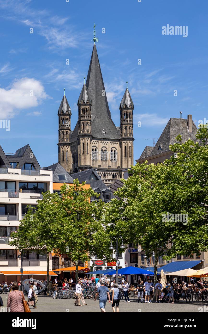 Towers of Great St. Martin church are rising high above Cologne urban ...