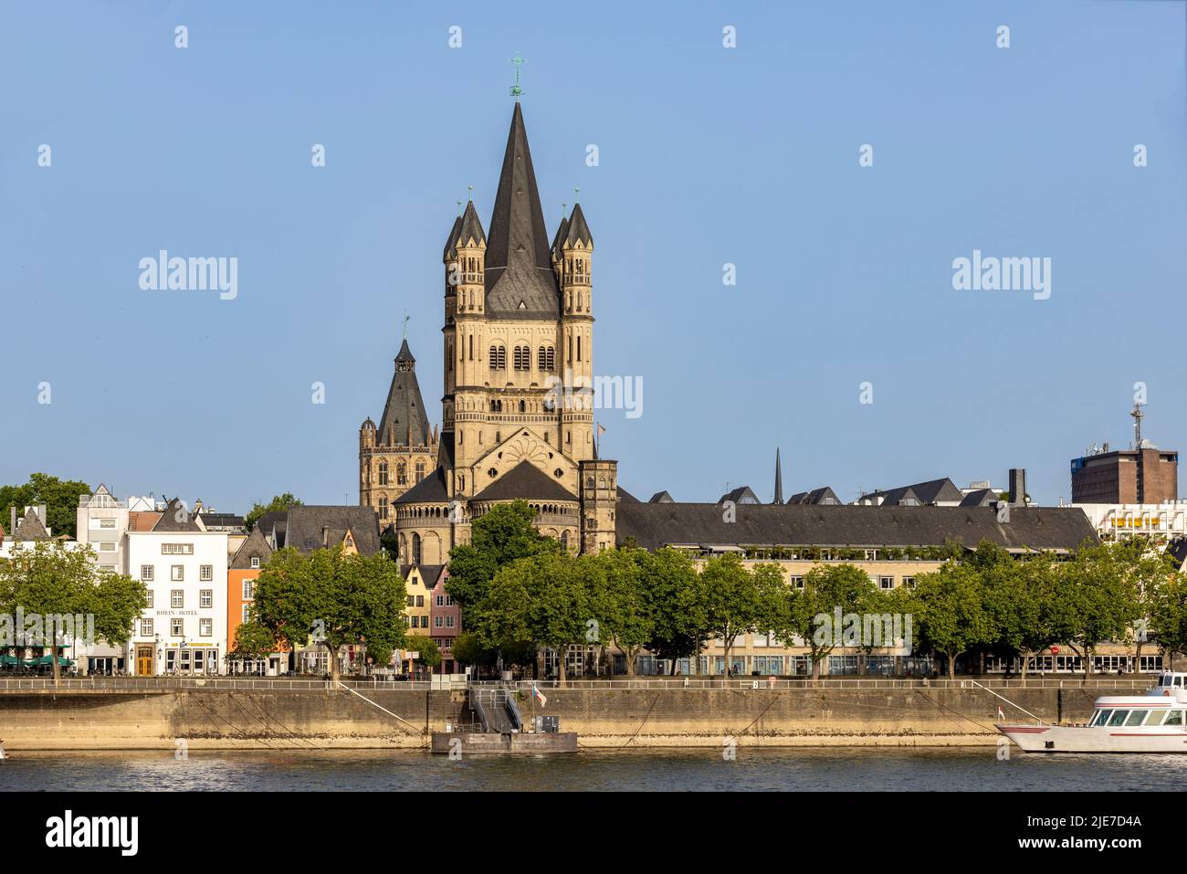 Towers of Great St. Martin church are rising high above Cologne urban ...