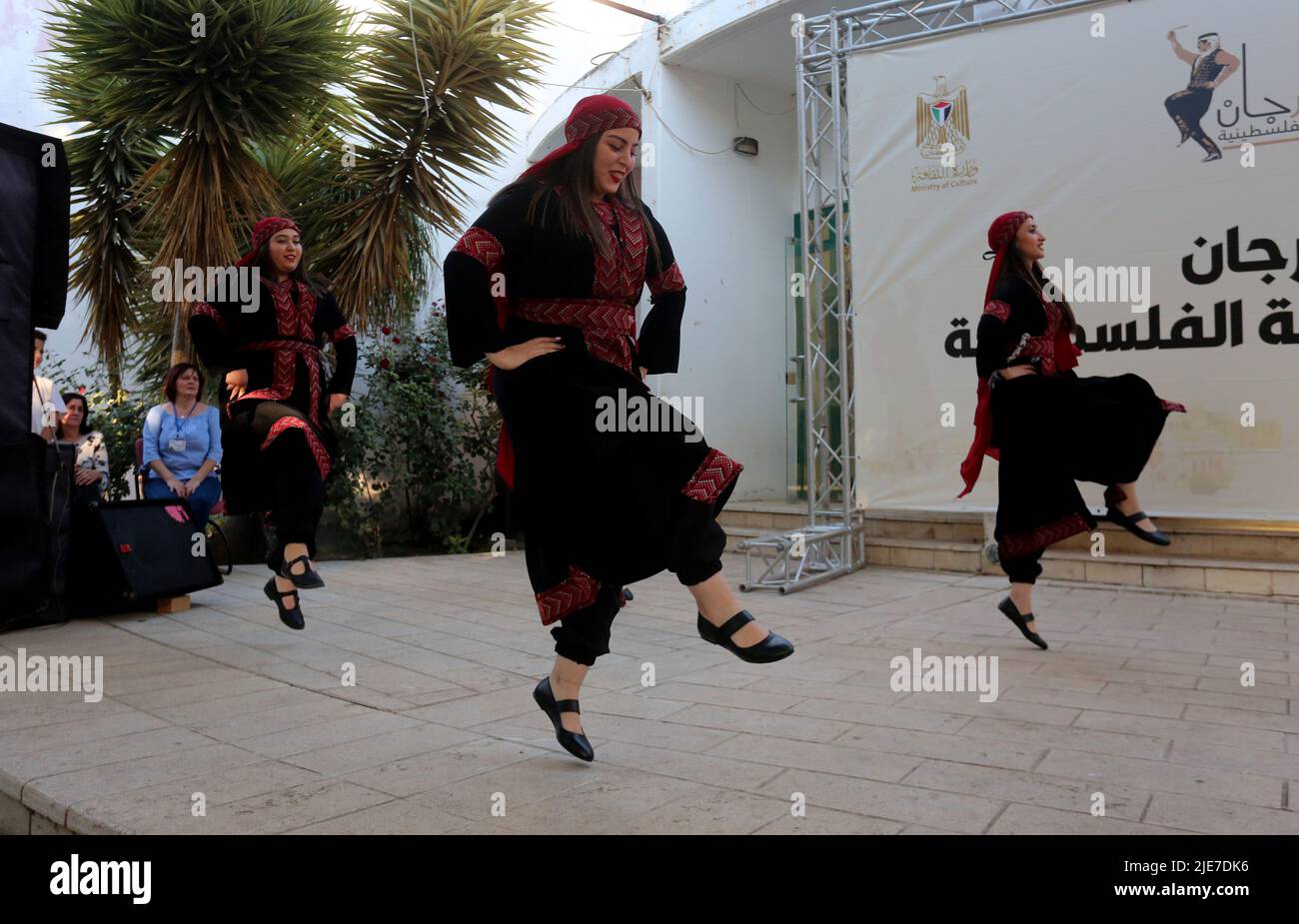 Nablus. 25th June, 2022. People perform the traditional dance Dabke during the Palestinian Popular Dabke Festival in the West Bank city of Nablus, on June 25, 2022. Credit: Nidal Eshtayeh/Xinhua/Alamy Live News Stock Photo