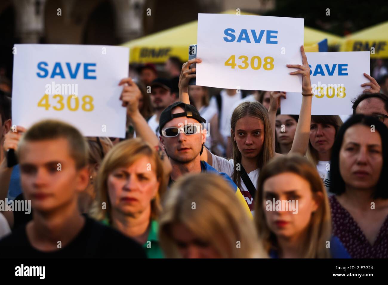Krakow, Krakow, Poland. 25th June, 2022. Ukrainians and Poles attend demonstration at the Main Square in support of Azovstal 4308 regiment defenders that are currently in Russian captivity. Krakow, Poland on June 25th, 2022. Peaceful rallies were held around the world in support of more than 2,500 Azovstal prisoners of war. Credit: ZUMA Press, Inc./Alamy Live News Stock Photo