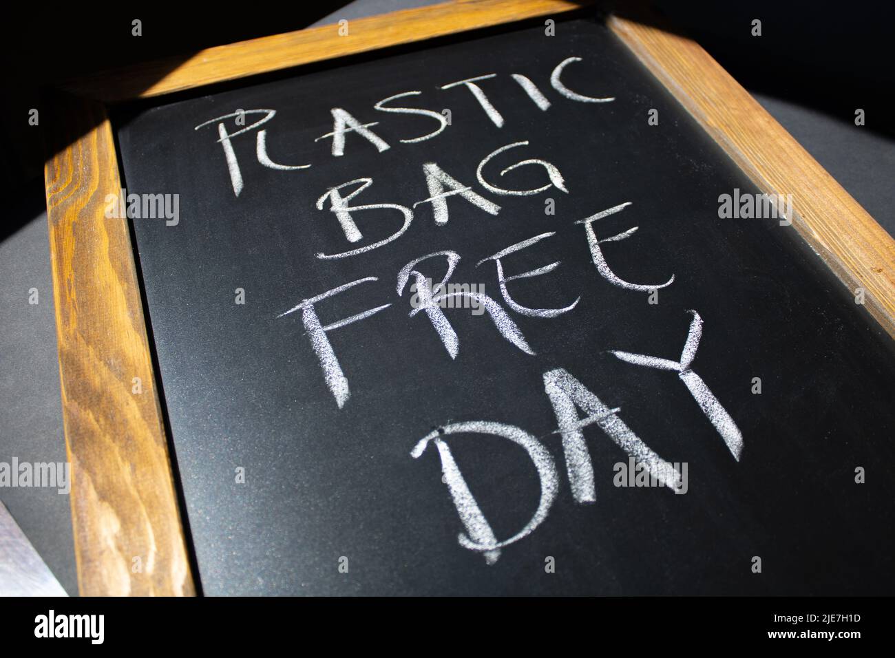 Plastic Bag Free Day is written on Chalkboard Stock Photo