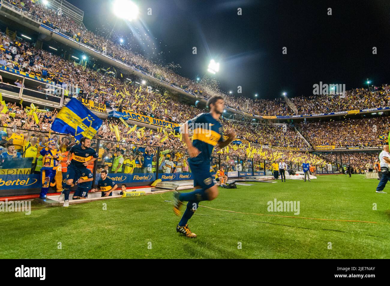 Boca Juniors supporters cheer to receive the home team at La Bombonera Stadium. Stock Photo