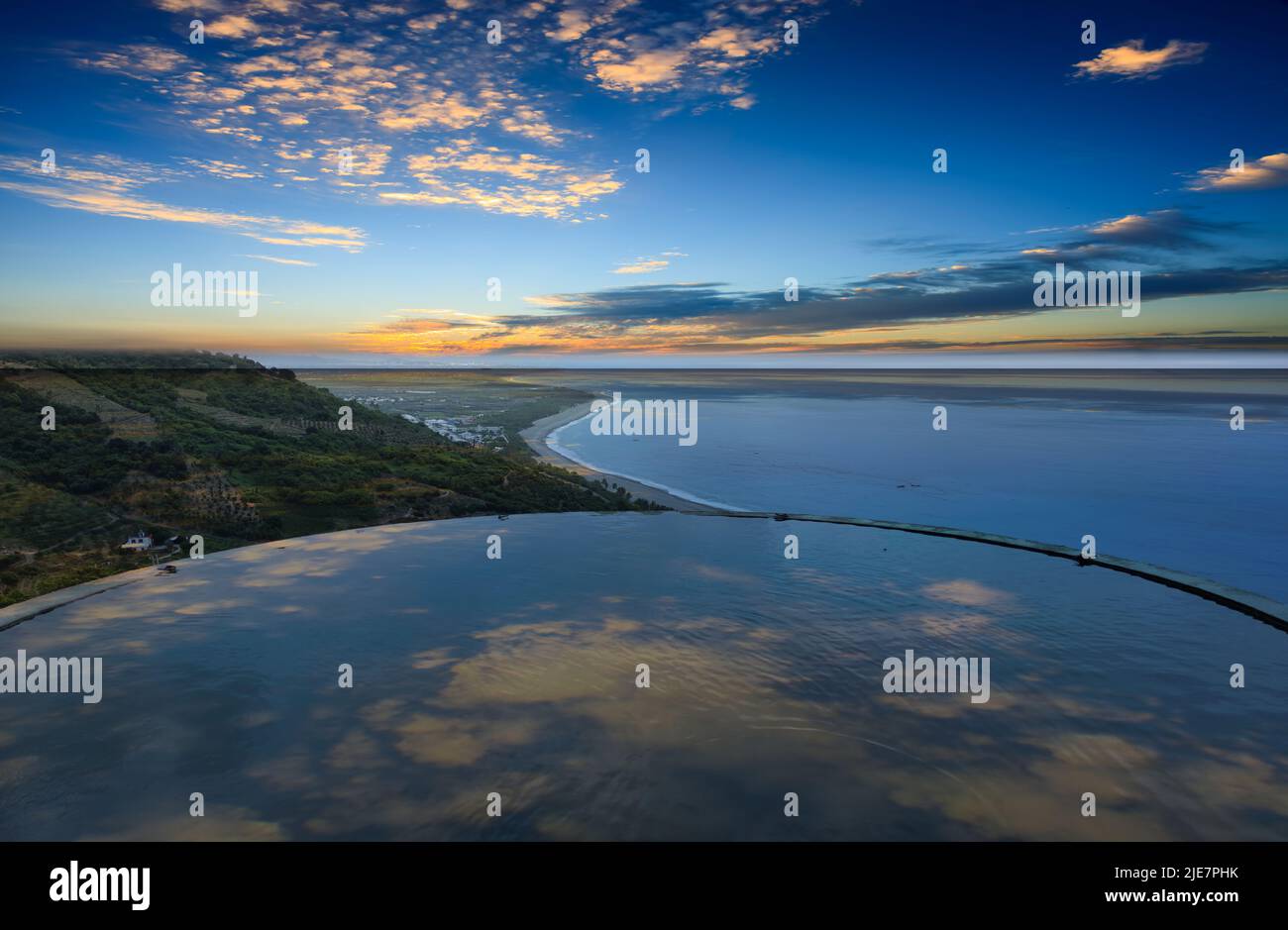 The Landscape View Of The Beautiful Eastern Coastline With Blue Sky And Water Tower Reflection From Huayuan Observation Deck, Taimali, Taitung Stock Photo