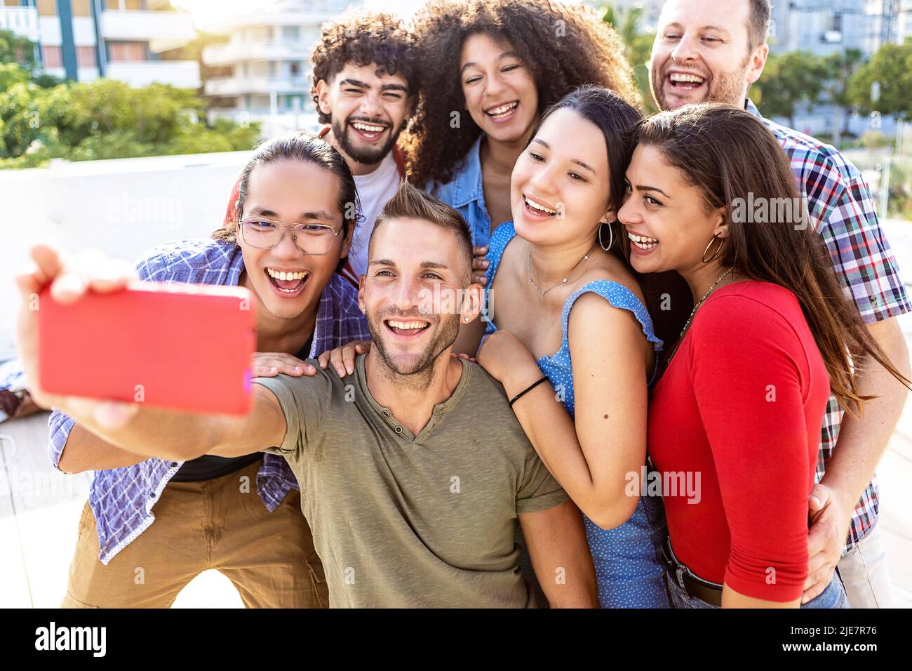 Happy young group of multiracial friends having fun on summer holidays Stock Photo