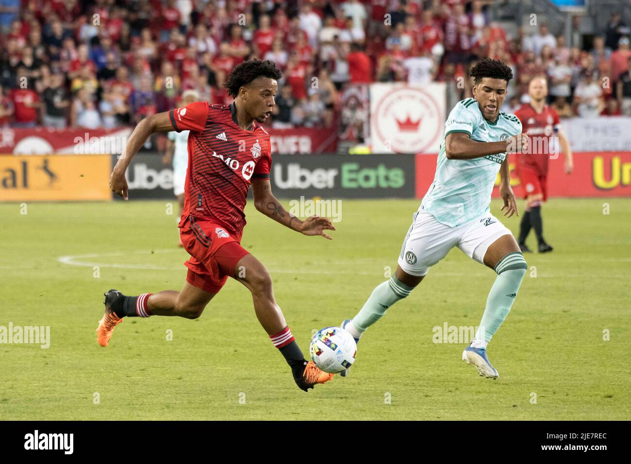 Toronto, Ontario, Canada. 25th June, 2022. Kosi Thompson (47) and Caleb Wiley (26) in action during the MLS game between Toronto FC and Atlanta United FC. The game ended 2-1 for Toronto FC. (Credit Image: © Angel Marchini/ZUMA Press Wire) Credit: ZUMA Press, Inc./Alamy Live News Stock Photo