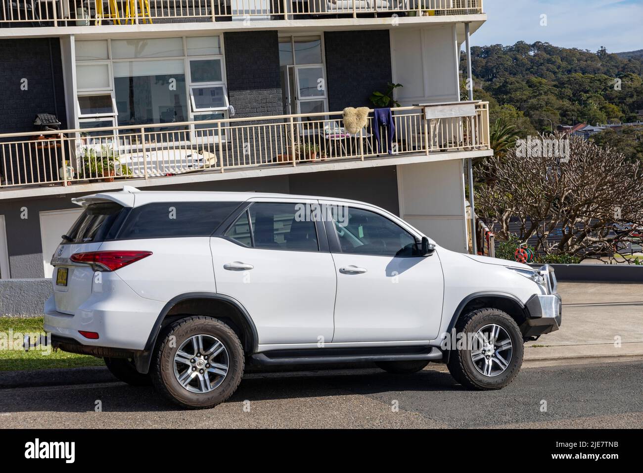 2020 model white Toyota Fortuner parked in Avalon Beach Sydney , a mid sized family SUV type vehicle also known as Toyota Hilux SW4,Australia Stock Photo
