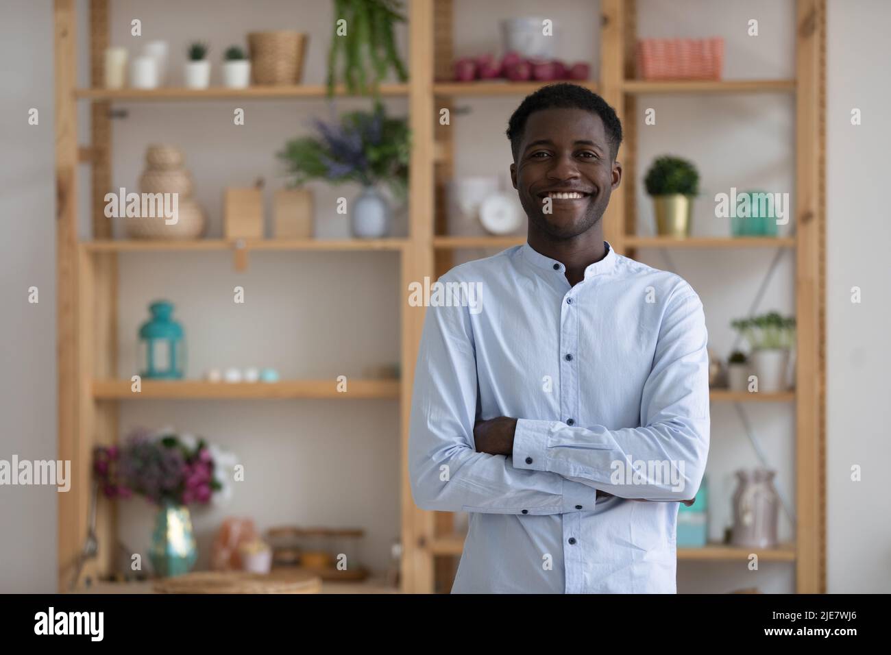 African businessman or office employee smile look at camera Stock Photo