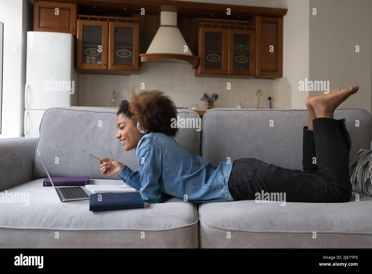 African girl student studying use laptop at home Stock Photo - Alamy
