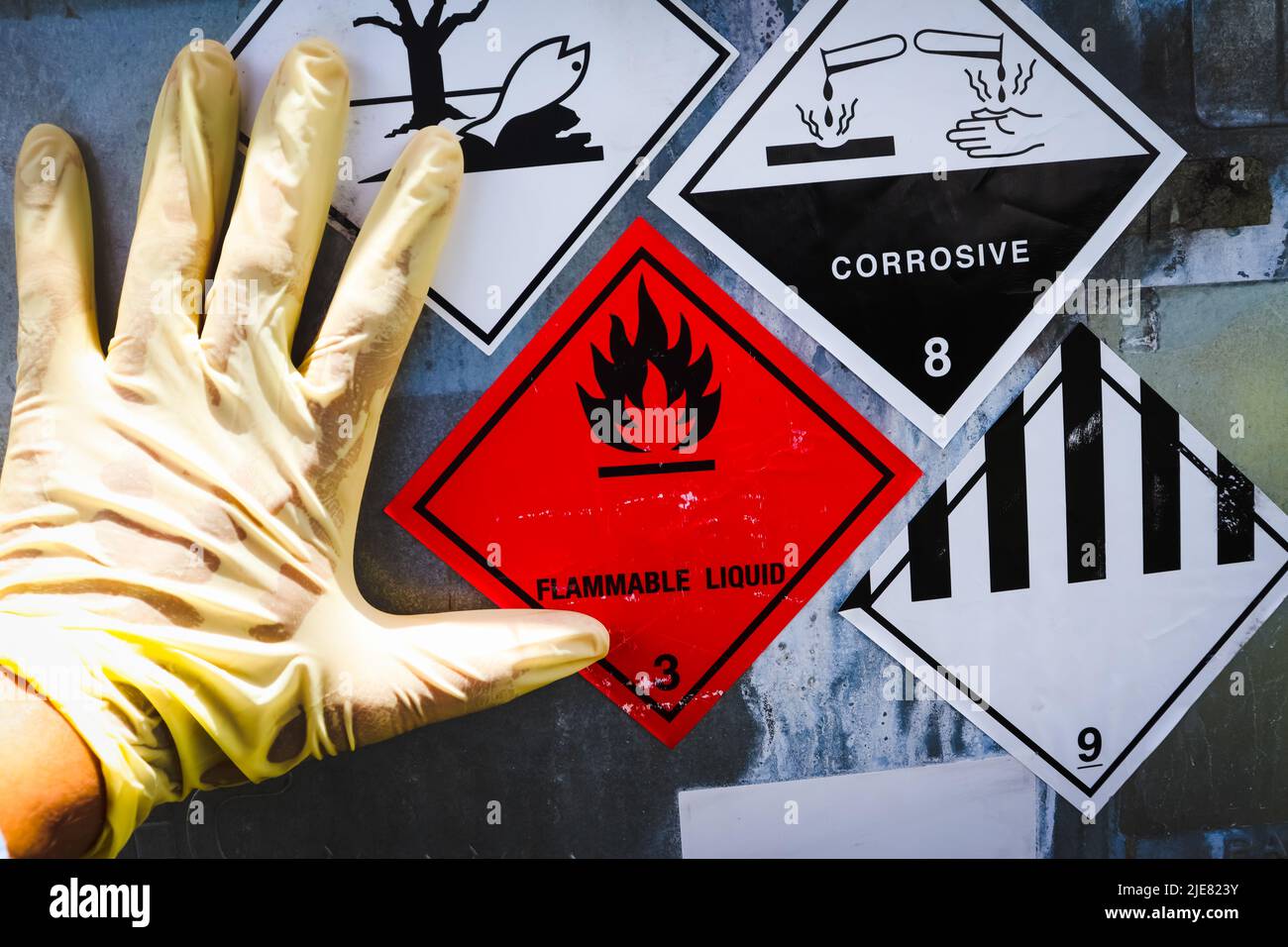 Warning symbol for chemical hazard on chemical container, chemical in factory Stock Photo