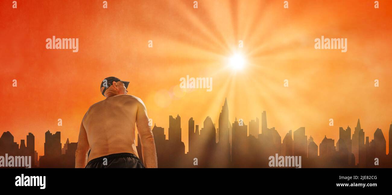 man suffering from hot weather in city, scorching summer day in heat wave Stock Photo