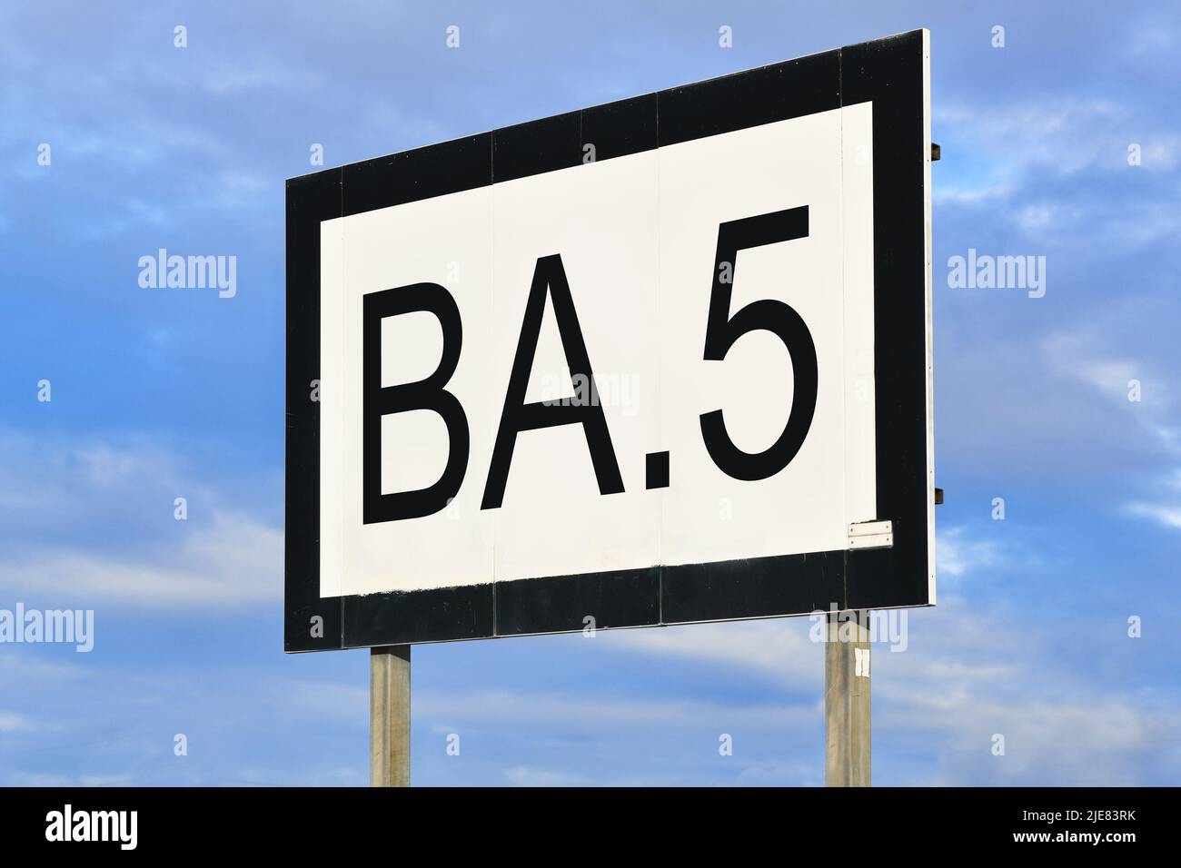 Omicron subvariant BA.5 virus mutation concept with text on billboard Stock Photo