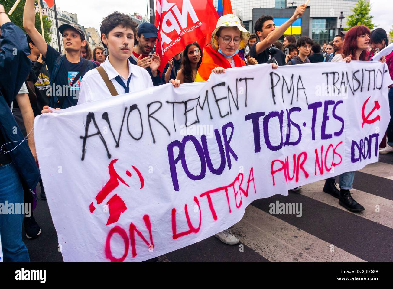 Paris, France, Crowd Feminists Marching in Gay Pride/ LGBTQI March, with Protest Banner in support of Abortion and M.A.P. (Medically Assisted Procreation) female empowerment signs Stock Photo
