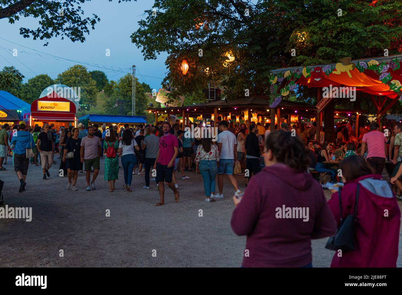 MUNICH, GERMANY - JUNE 25, 2022: After two years of pandemic, people are back out on the yearly Summer-Tollwood Festival in Munich. Stock Photo