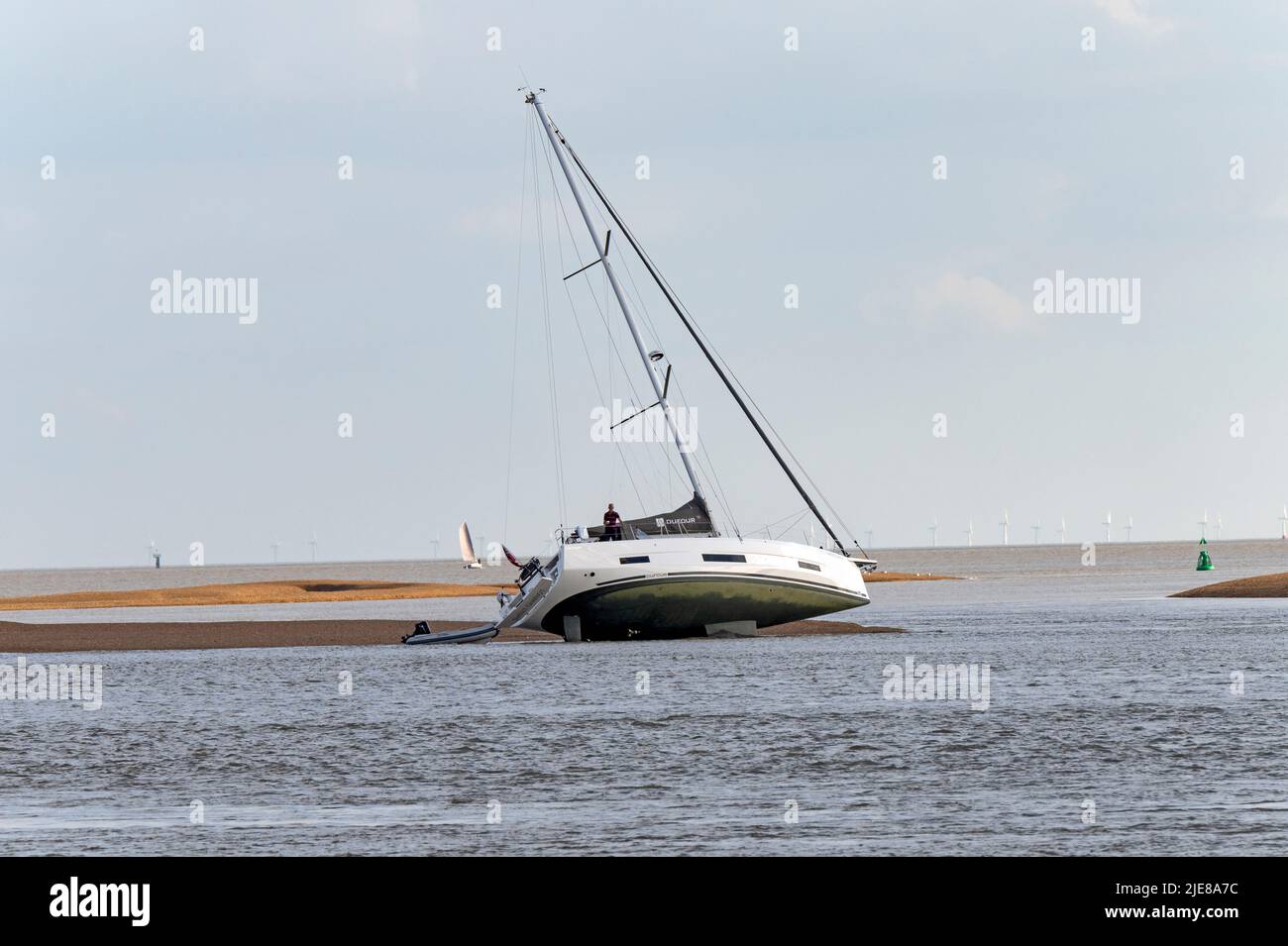 Yacht aground river Deben estuary Bawdsey Ferry Suffolk Stock Photo