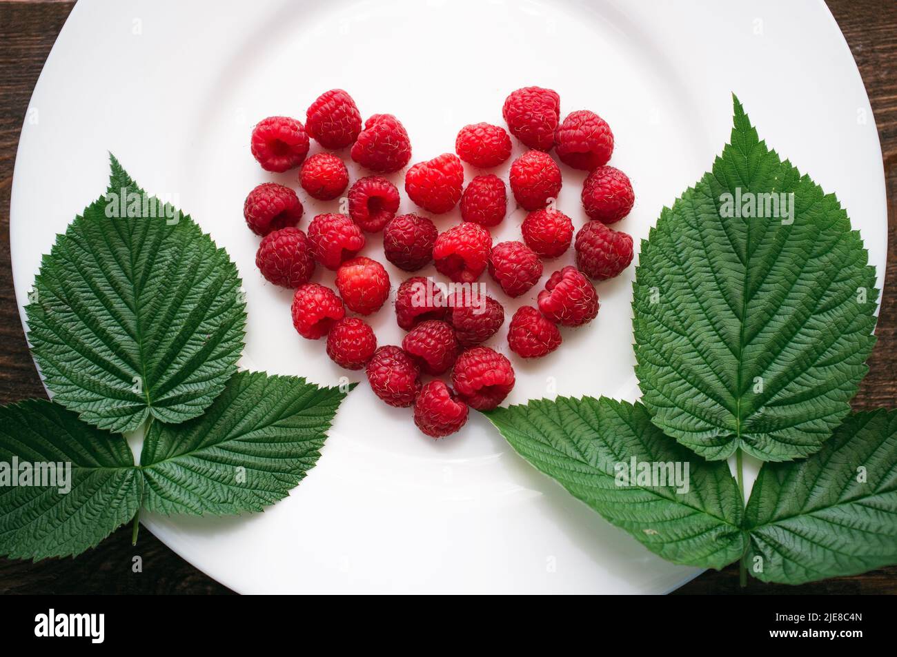 Fresh raspberry green leaf hi-res stock photography and images - Alamy