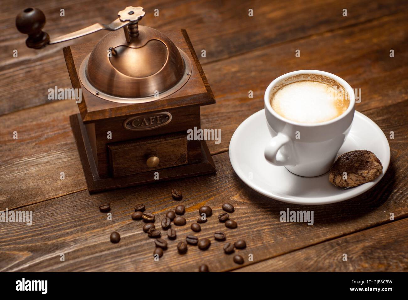 Cappuccino, coffee and coffeemill Stock Photo Alamy