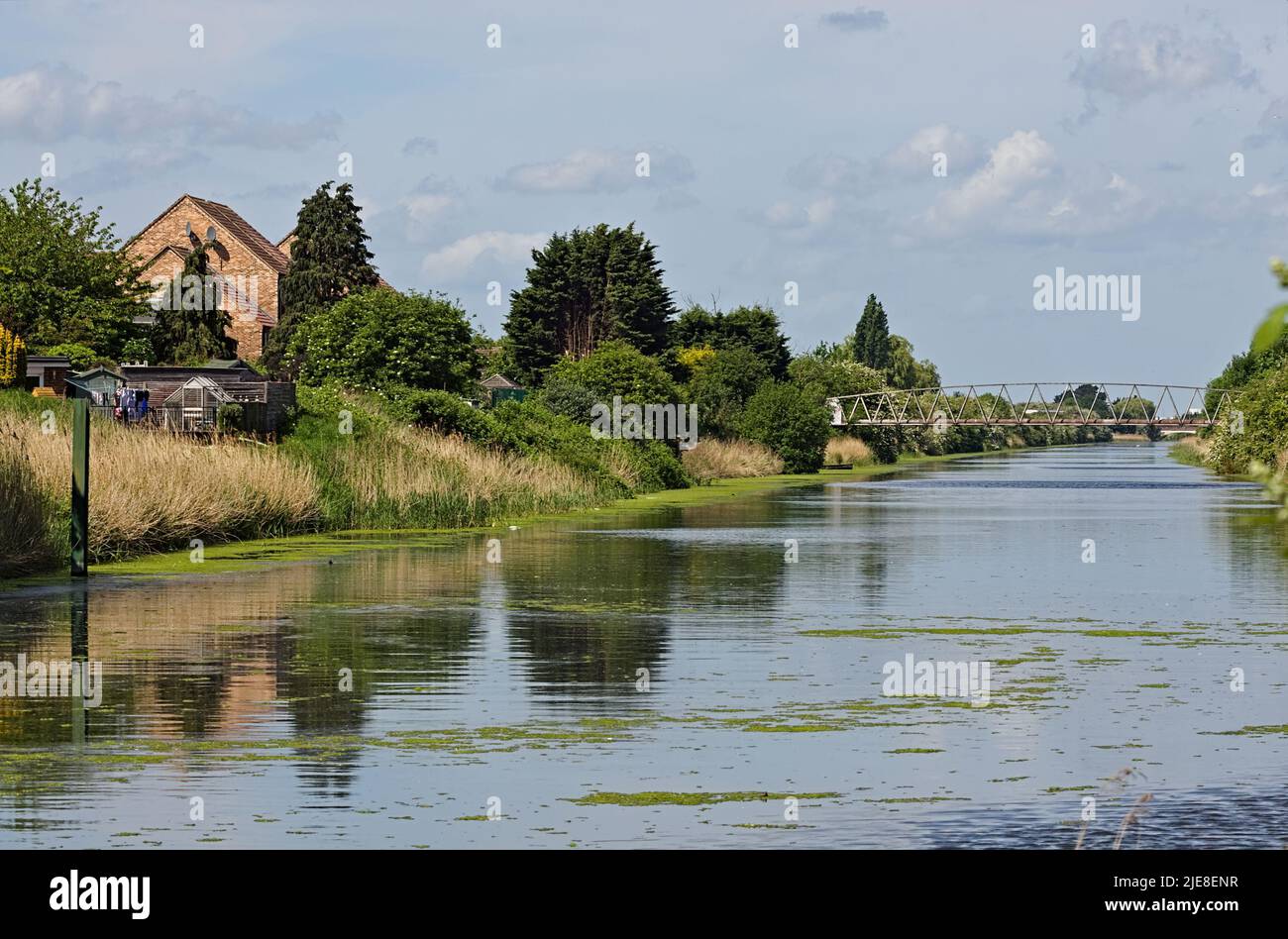 The south forty-foot waterway and riverbank with a water bridge in the distance. Stock Photo