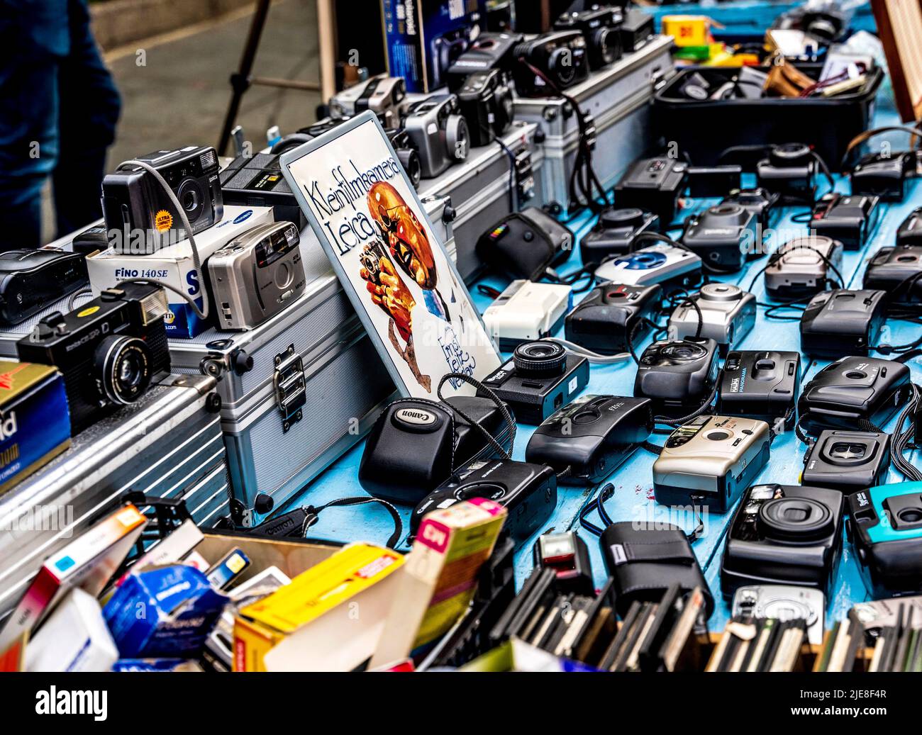 Iconic London market stalls in Portobello Road with vintage cameras and