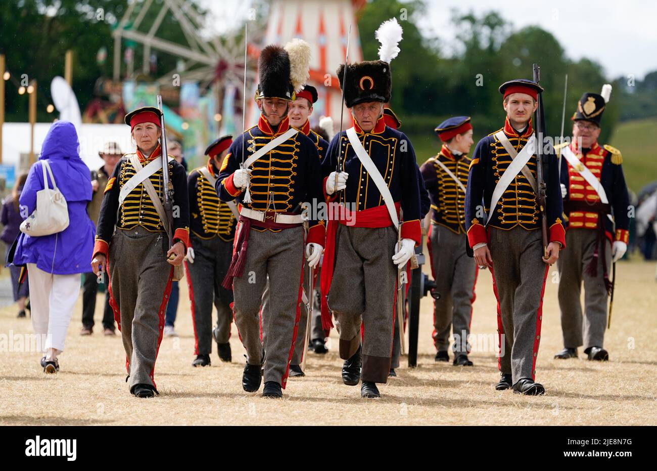 Members of the Whinyates Rocket troop of the Royal House Artillery, parade around the festival ground during the Chalke Valley History festival at Broad Chalke, Near Salisbury, Wiltshire. Picture date: Sunday June 26, 2022. Stock Photo