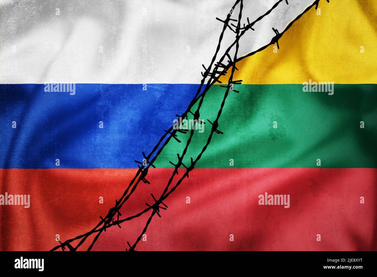 Grunge flags of Russian Federation and Lithuania divided by barb wire illustration, concept of tense relations between west and Russia Stock Photo