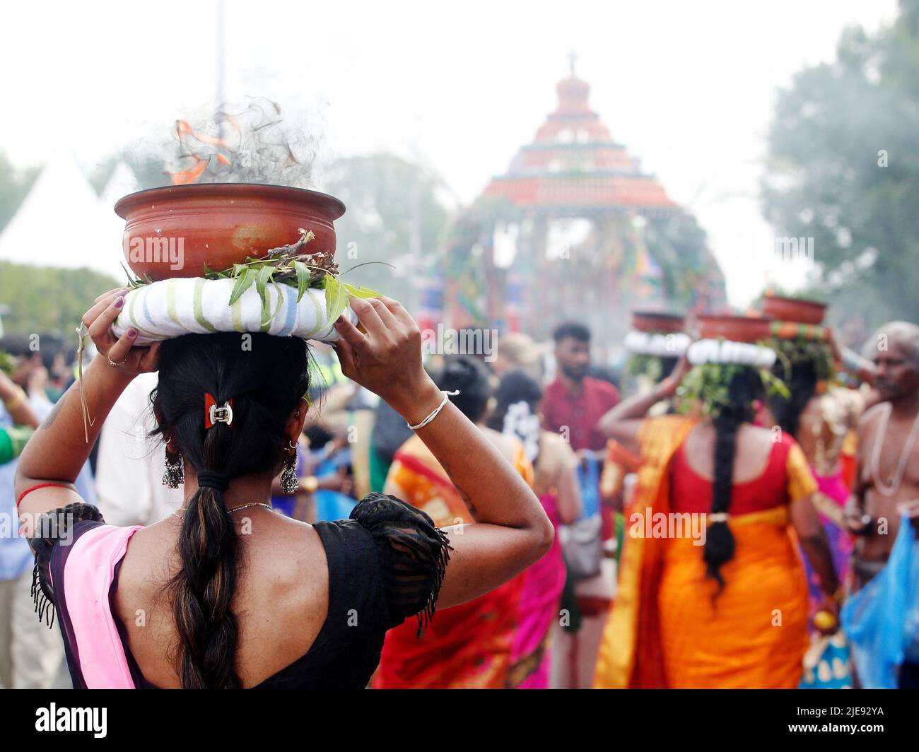 Hamm, Germany. 26th June, 2022. Hindus take part in the great procession  for the annual festival of the Hindu Shankarar Sri Kamadchi. The organizer  is the Hindu community of Germany. Credit: Roland