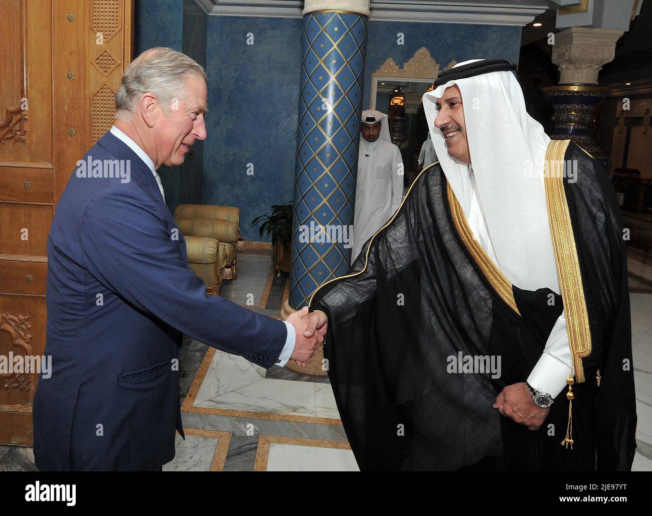 File photo dated 13/3/2013 of the Prince of Wales shakes hands with the Qatari Prime Minister Sheikh Hamad Bin Jassim al Thani, at his residence outside Doha, Qatar. The Prince accepted large cash donations totalling three million euros from the former Qatari prime minister, the Sunday Times has reported. The newspaper claimed the prince personally accepted the cash donations for his charity the Prince of Wales's Charitable Fund (PWCF) between 2011 and 2015 from Sheikh Hamad bin Jassim who was prime minister of Qatar between 2007 and 2013. Issue date: Sunday June 26, 2022. Stock Photo