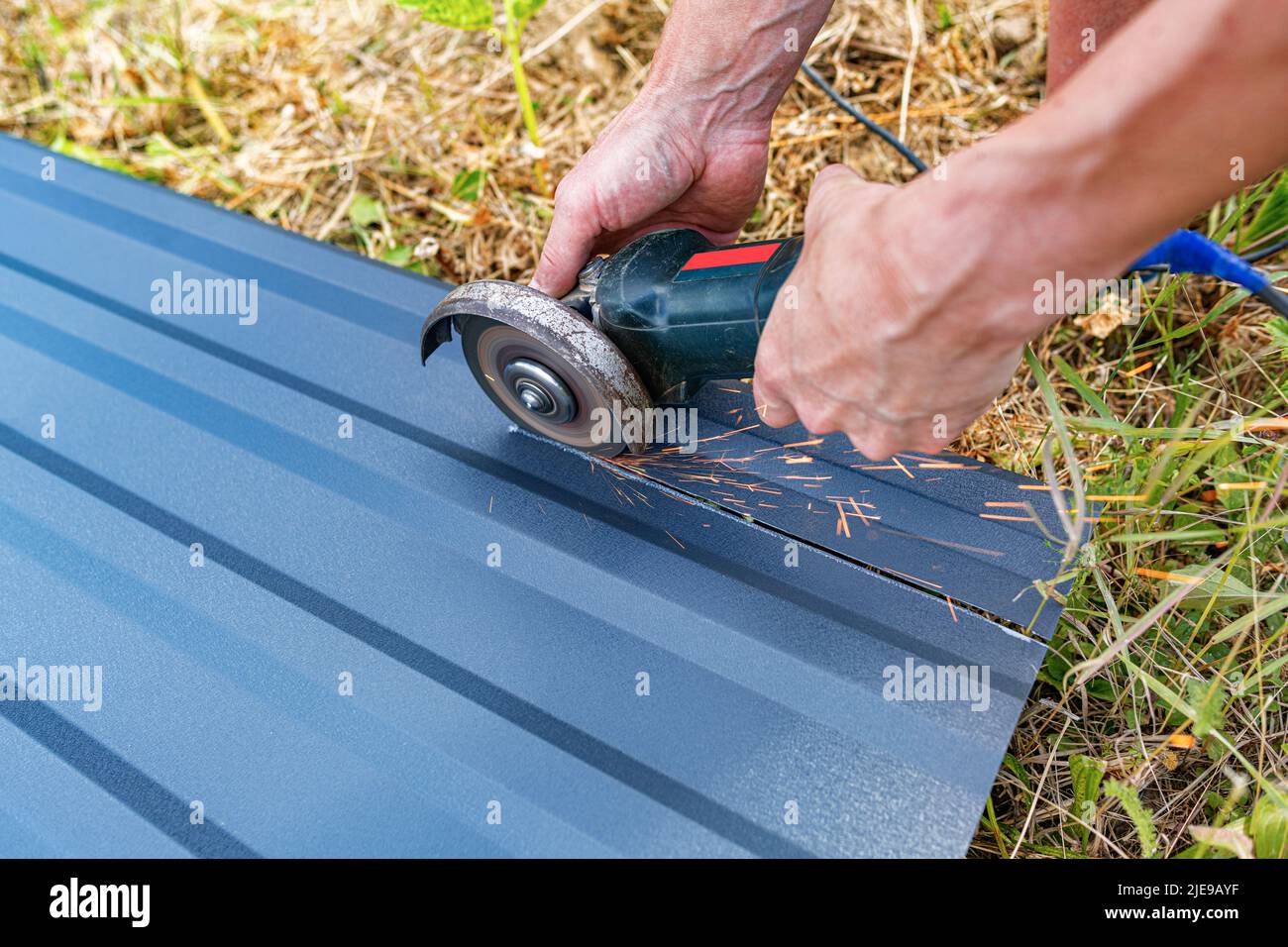 Cutting profiled sheet grinder Stock Photo Alamy