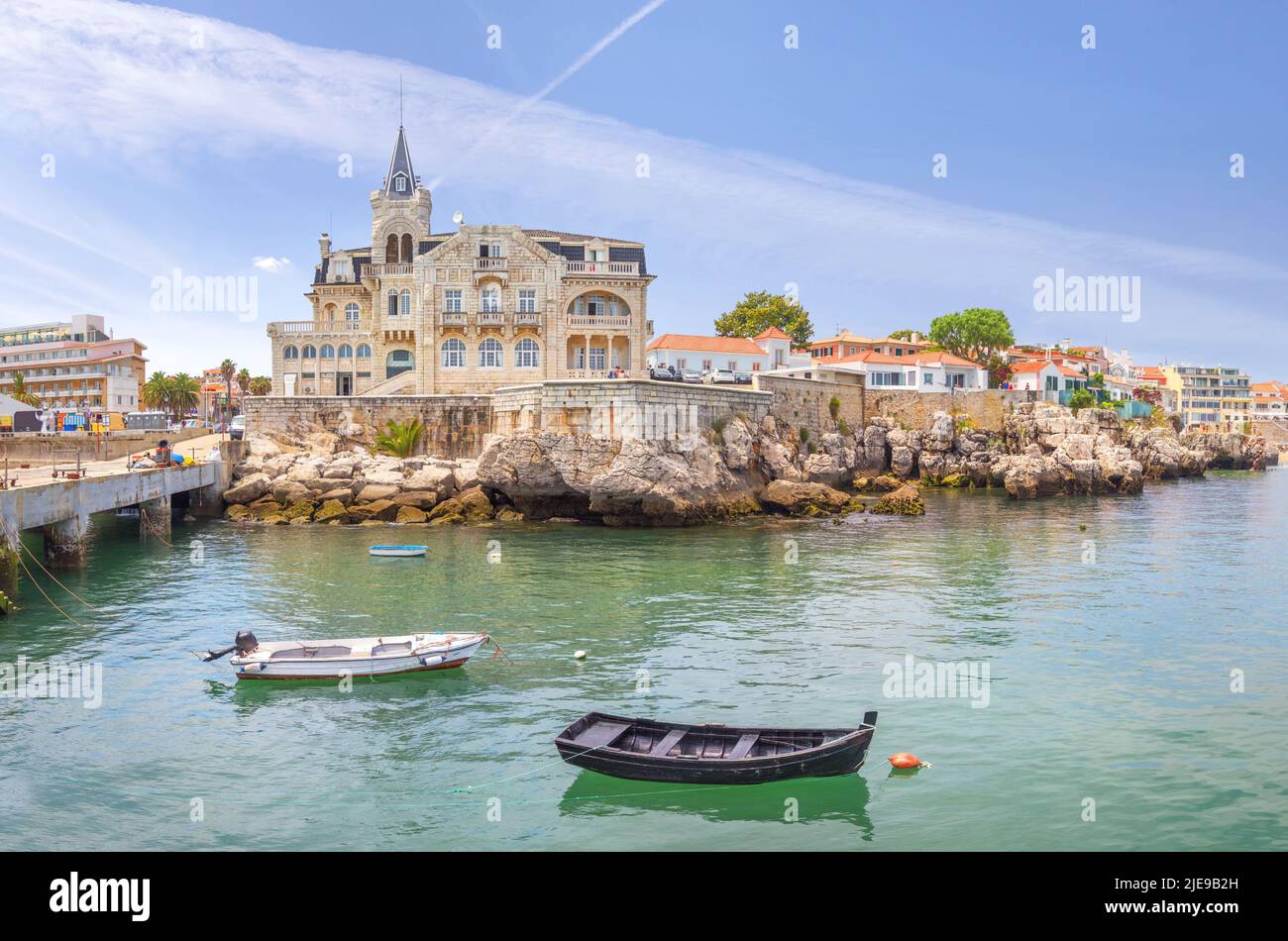 Cascais near Lisbon, seaside town. The house in the center is the Seixas Palace, built on the ocean at the beginning of the 20th century. Portugal Stock Photo
