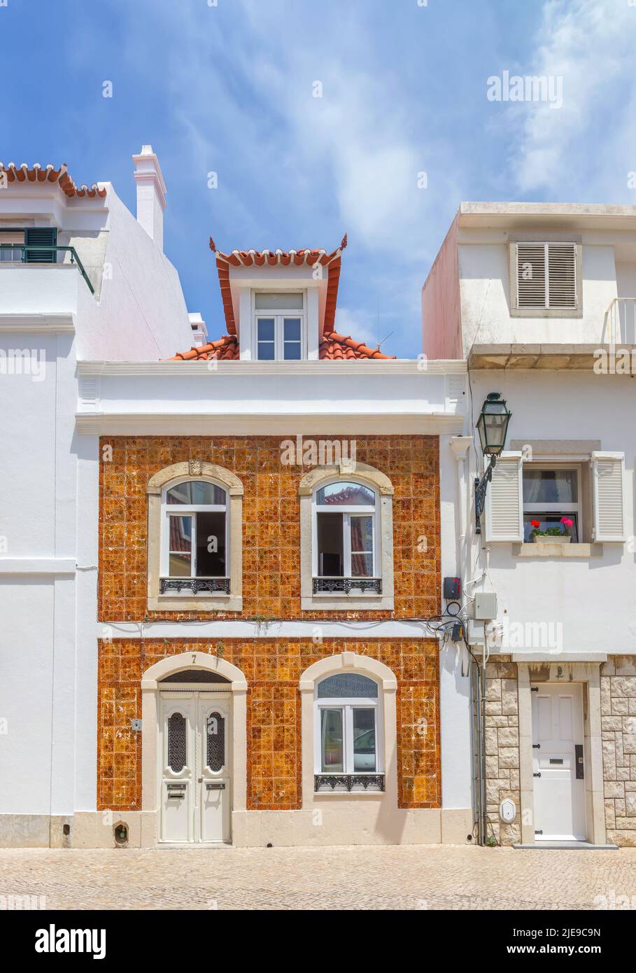 Fragment of the facade of the house, tiled azulejo. Cascais, Portugal Stock Photo