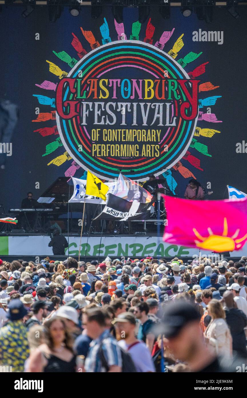 Glastonbury, UK. 26th June, 2022. Flags, including Wish you were here and a Diana Ross LGBT one, as Herbie Hancok plays the Pyramid stage - The 50th 2022 Glastonbury Festival, Worthy Farm. Glastonbury, Credit: Guy Bell/Alamy Live News Stock Photo