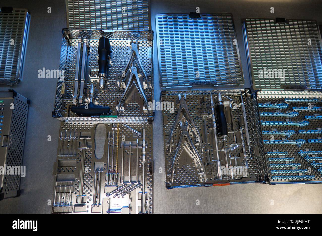 titanium plates and instrument for ankle surgery are placed on an