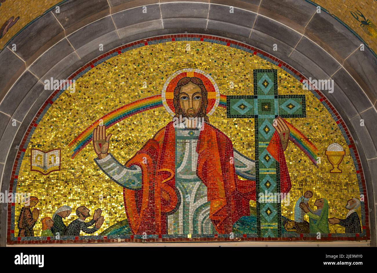 Glass art work of Jesus with cross at Basilica of Sainte-Anne-de-Beaupre, Cathedral, Quebec Stock Photo