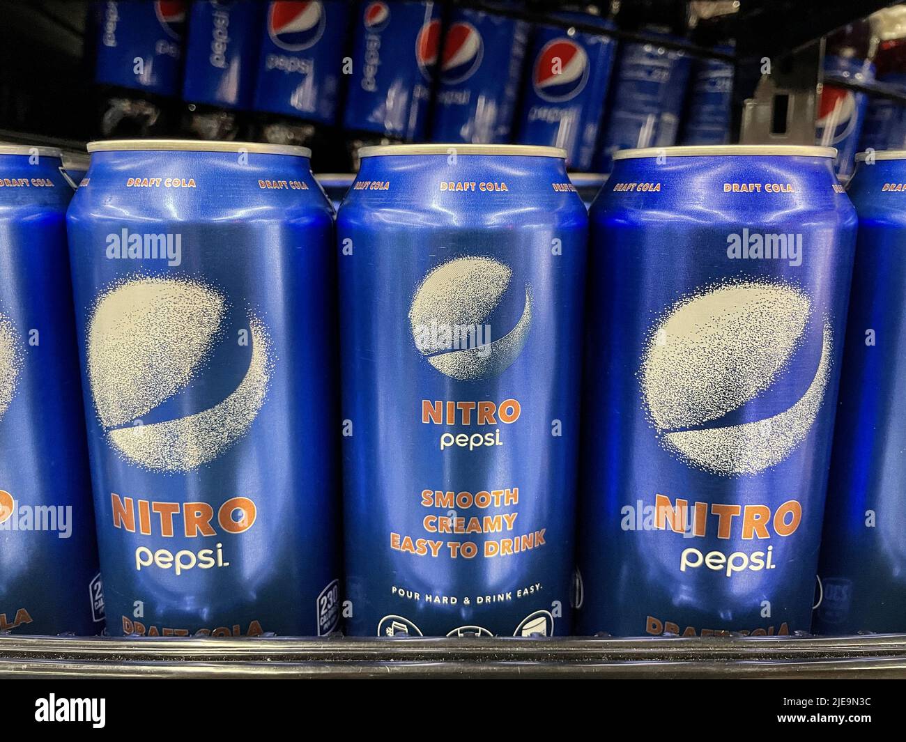 Nitro Pepsi display. Nitro Pepsi is a specialty nitrogen-infused cola. The addition of nitrogen gas to Pepsi creates a unique texture. Stock Photo