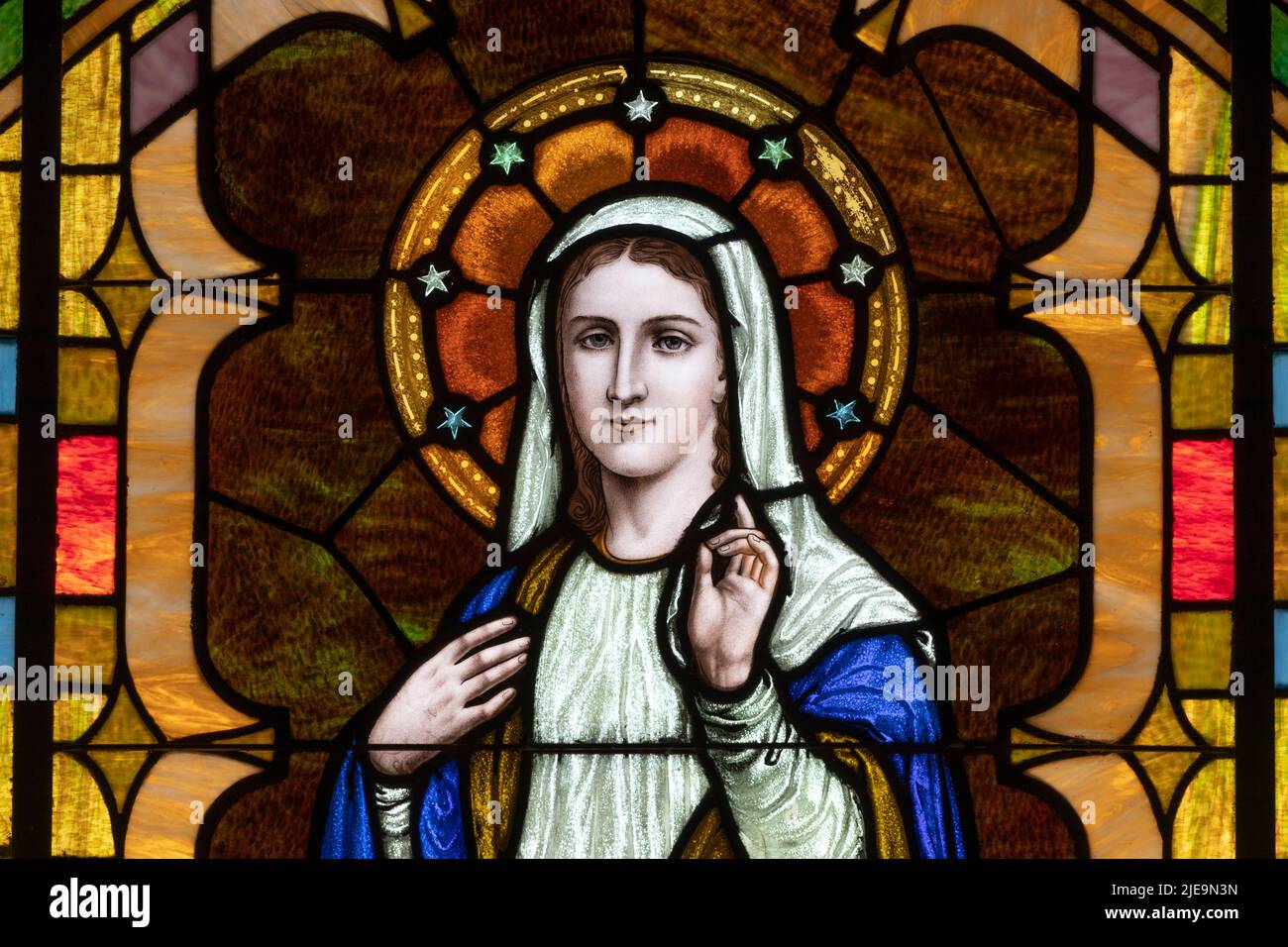 Cincinnati - Circa June 2022: Depiction of Mary, mother of Jesus Christ in stained glass at a church. Stock Photo