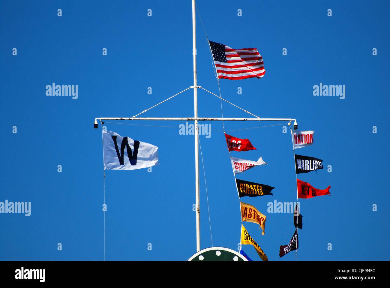 The W flag is raised at Wrigley Field alerting the town of a win