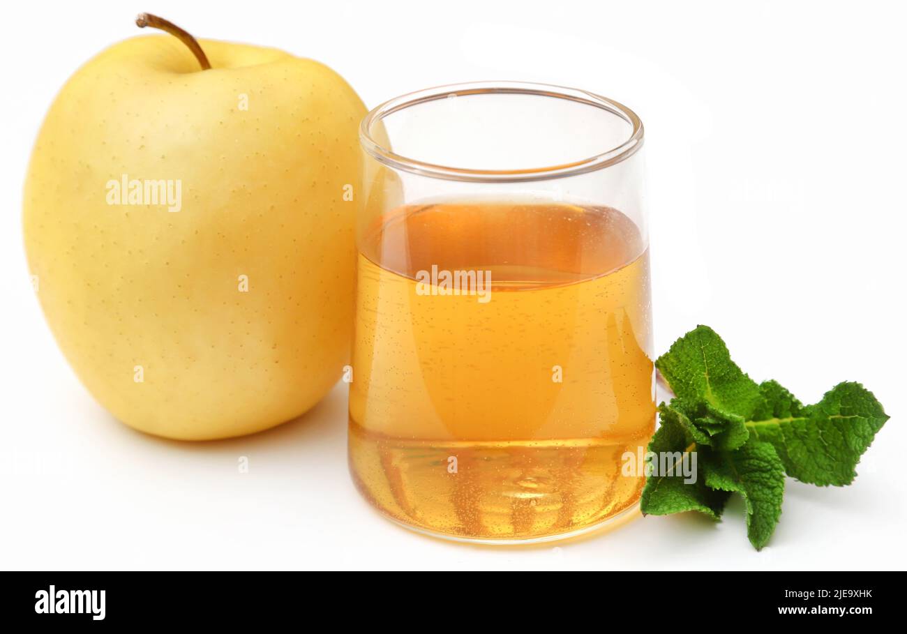 Apple cider vinegar with fresh fruit and mint leaves Stock Photo