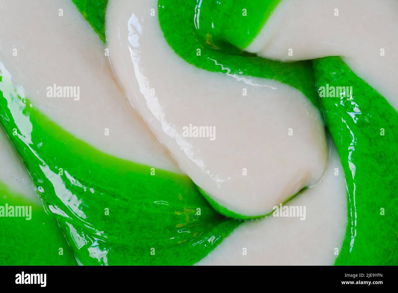 Top view: green and white large spiral candy lollipop - close up Stock ...