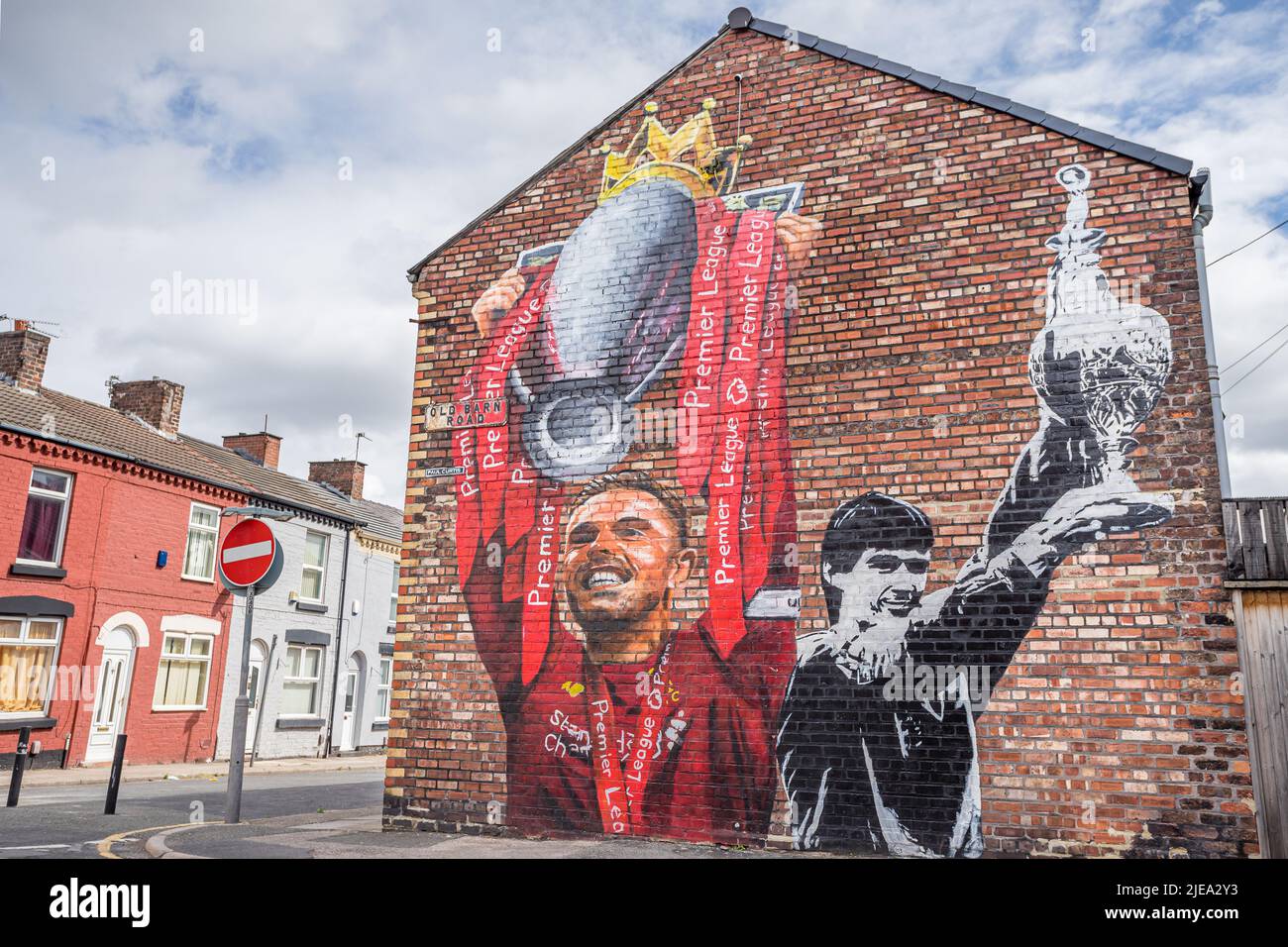 Jordan Henderson and Alan Hansen mural pictured on a house in Anfield near to Liverpool FCs stadium.  The current and former captains of the club are Stock Photo