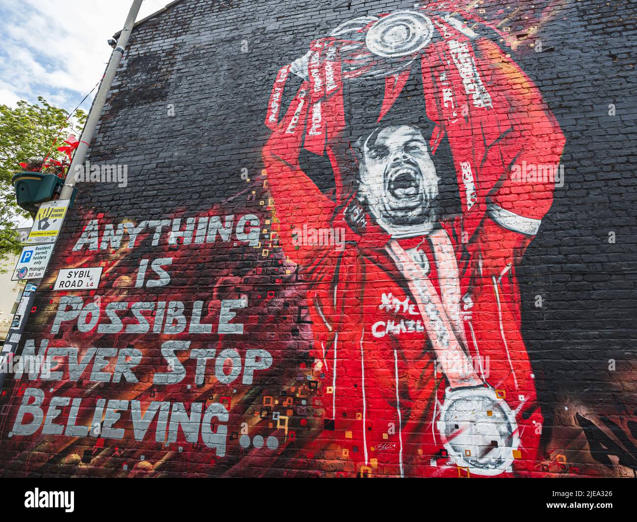 A vivid mural of Liverpool FC captain Jordan Henderson lifting the Premier League trophy in the 2019-20 season.  Seen in Anfield, Liverpool in June 20 Stock Photo