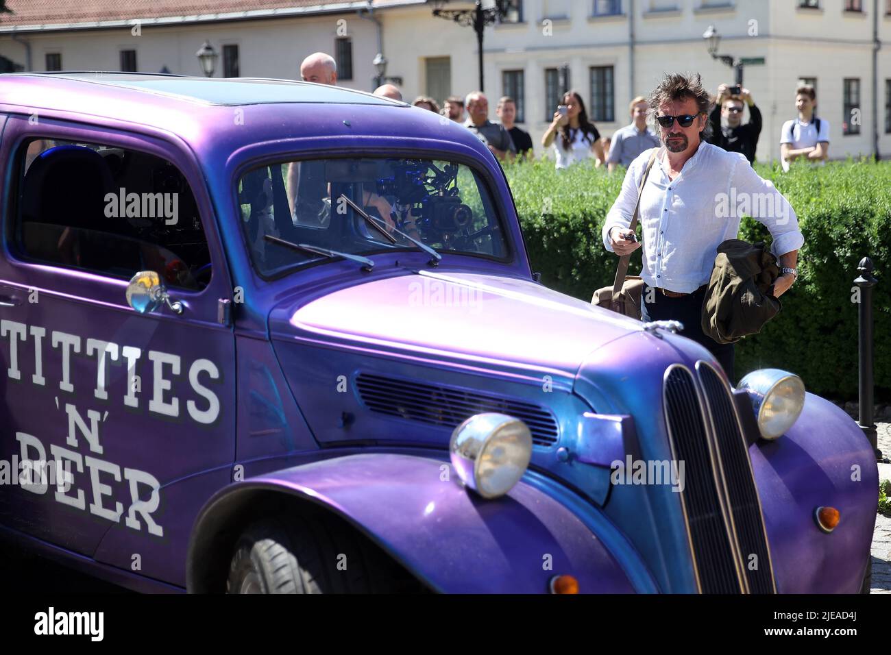 The Grand Tour star, Richard Hammond, looks at a purple vintage car in Cracow, while on tour filming the show in Poland. The Grand Tour is a British motoring television series, created by Jeremy Clarkson, Richard Hammond, James May, and Andy Wilman, made for Amazon exclusively for its online streaming service Amazon Prime Video which premiered in 2016. The programme was conceived in the wake of the departure of Clarkson, Hammond, May and Wilman from the BBC series Top Gear. (Photo by Vito Corleone / SOPA Images/Sipa USA) Stock Photo