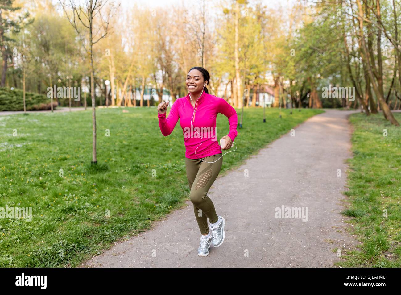 Young Female Runner in Jogging Outfit during Her Regular Training Exercises  Outdoors Stock Photo - Image of healthy, lifestyle: 197648298