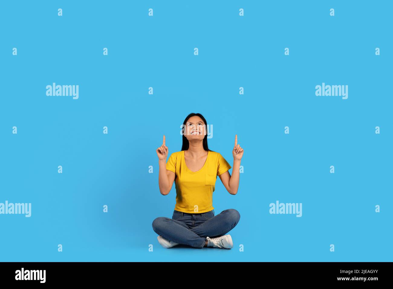 Asian woman sitting floor hi-res stock photography and images - Alamy