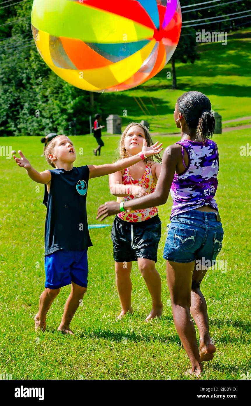 African american boy catching ball hi-res stock photography and images