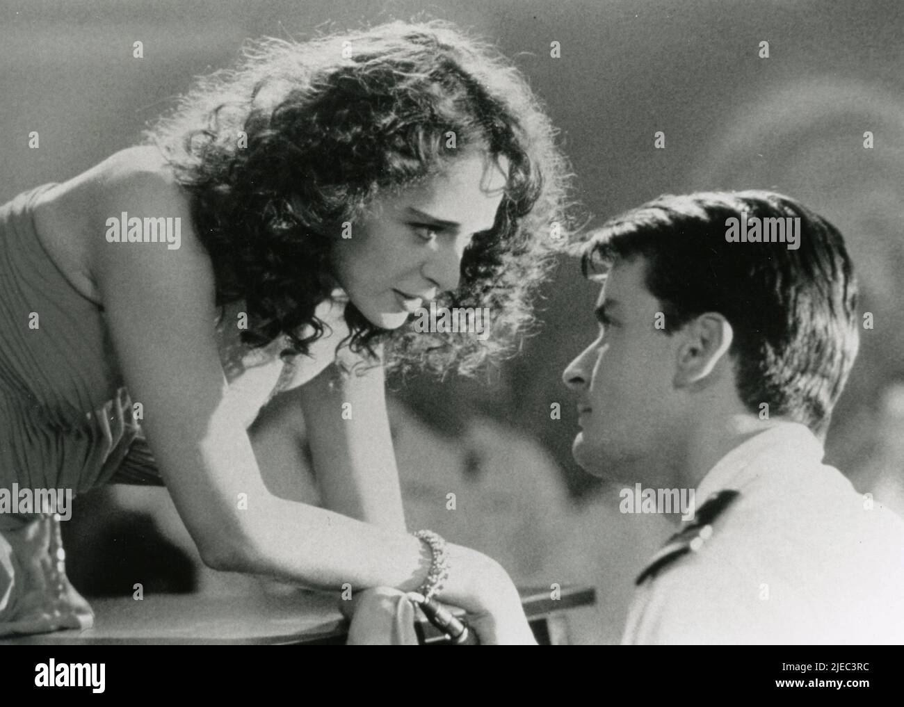 Italian actress Valeria Golino and American actor Charlie Sheen in the movie Hot Shots!, USA 1991 Stock Photo