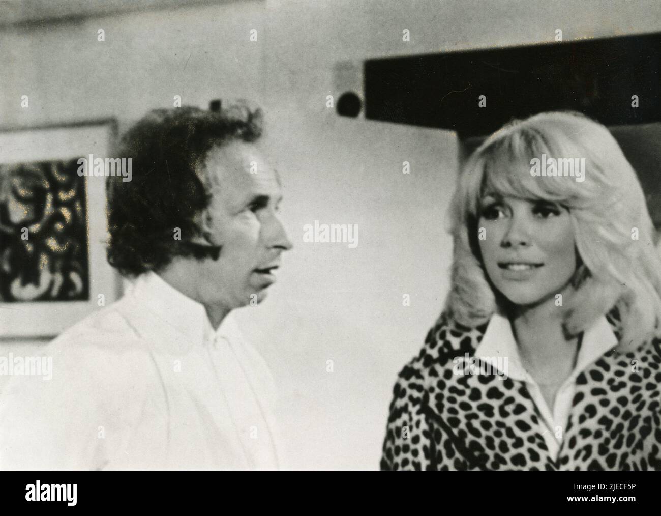 French actress Mirelle Darc and actor Pierre Richard in the movie The Tall Blond Man with One Black Shoe, France 1972 Stock Photo